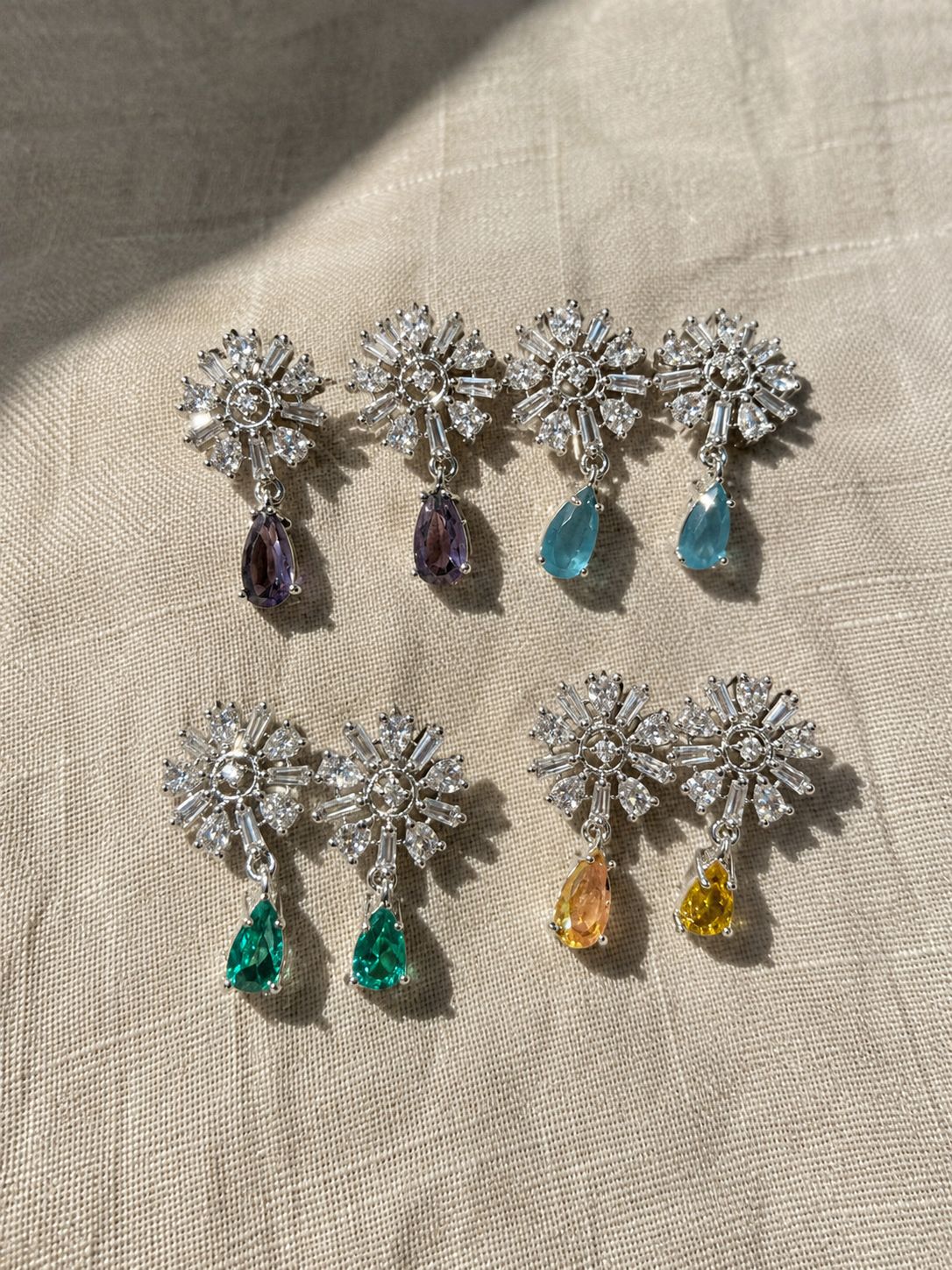 AD STUDS WITH DANGLE
